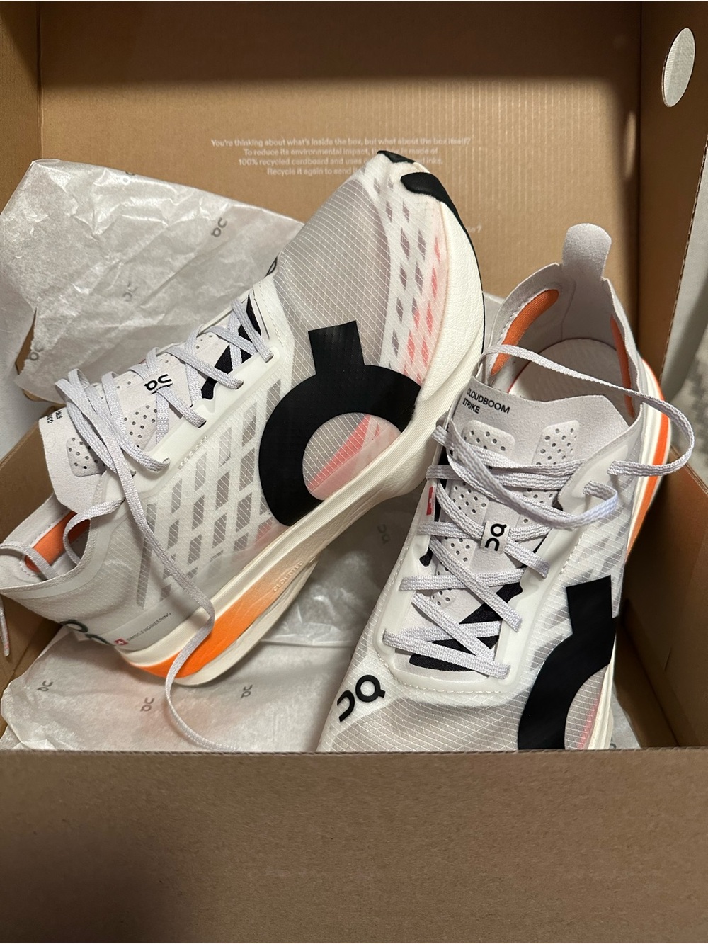On Running Cloudboom Strike Womans Road Racing Sneakers White and Black